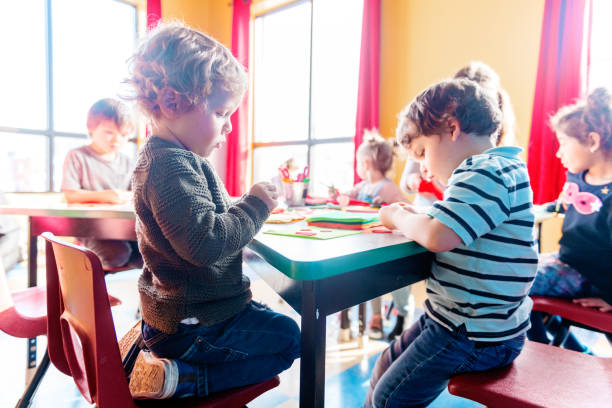 istock Children and educator preparing Valentine's day 1127397614