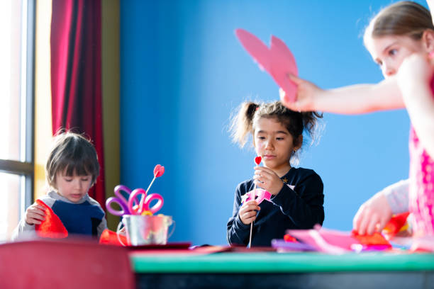 istock Children and educator preparing Valentine's day 1127398692