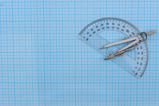 istock Draughtsmanship equipment with blue millimeter paper 1127400552