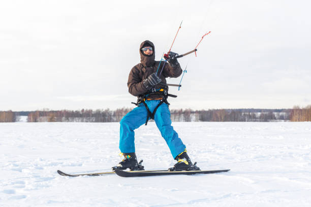 istock The skier goes on the snow field with kite 1127401055