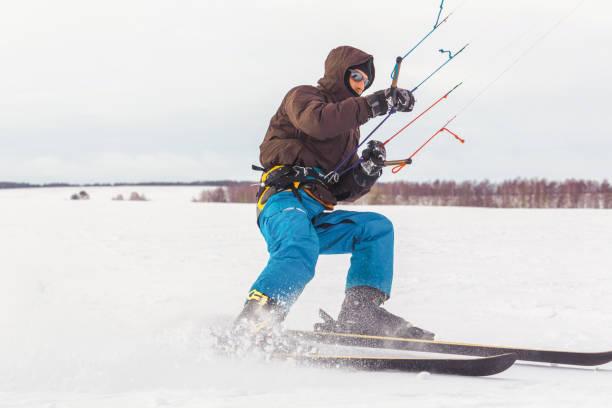 istock The skier goes on the snow field with kite 1127401065