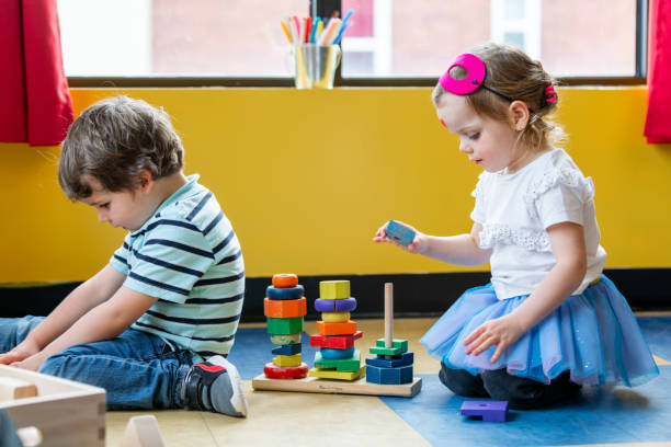 istock Children and educator preparing Valentine's day 1127401826