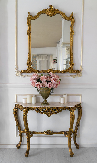 Golden vintage vanity mirror and golden counter table