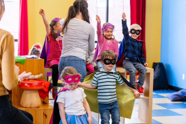 istock Children and educator preparing Valentine's day 1127402596