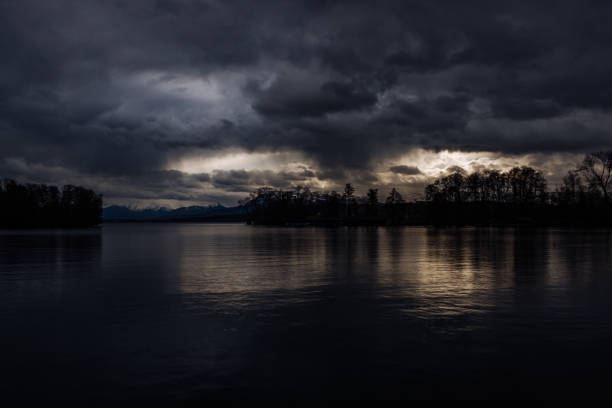 istock Scenic View Of Lake Against Cloudy Sky During Sunset 1127408562