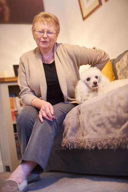 istock Senior woman in pain with her back 1127411094