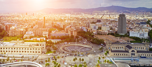 Plaza Espanya in Barcelona city and wide angle cityscape . Catalonia, Spain.