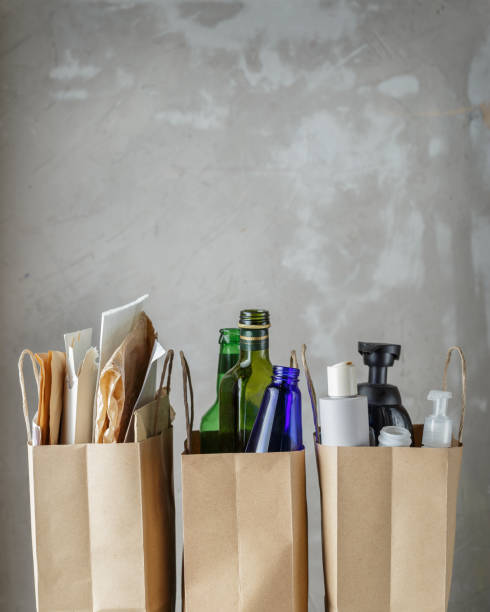 istock Three paper bags with sorted household waste 1127414645