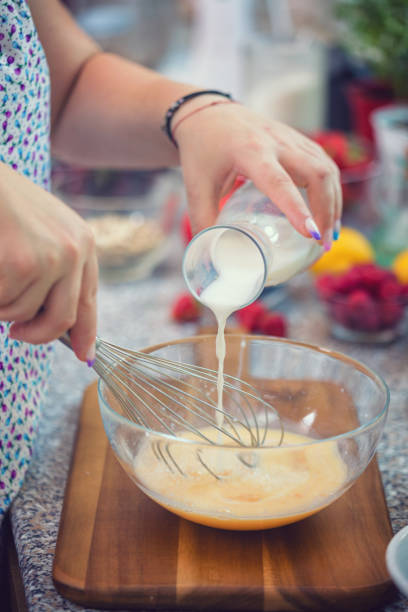 istock Woman Preparing Pancakes 1127414697