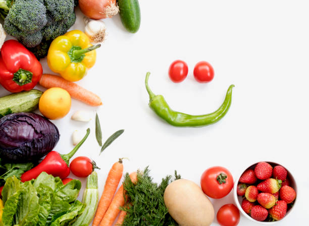 istock Organic fresh vegetables and fruits frame on white background, top view, copy space 1127415217