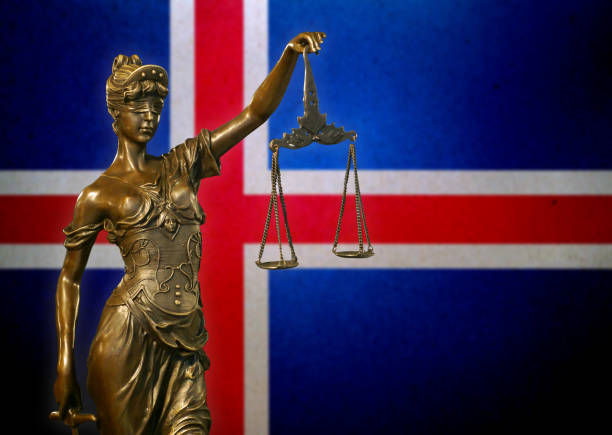 istock Lady Justice before an Icelandic flag 1127415912