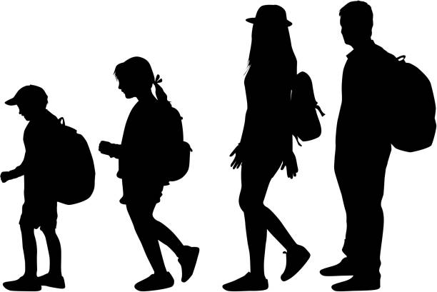 istock Silhouette of family on a walk. 1127415981