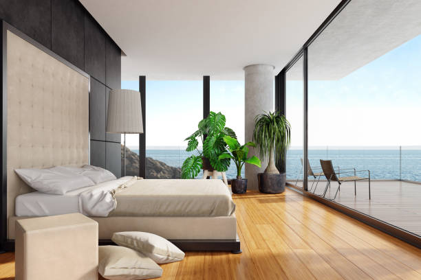 istock Modern luxurious bedroom with bamboo floor in a villa by the beach 1127418383