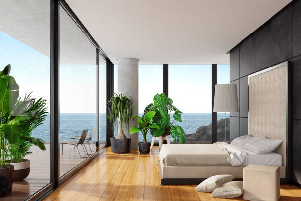 istock Modern luxurious bedroom with bamboo floor in a villa by the beach 1127418385
