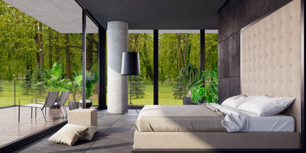 istock Modern panoramic luxury villa bedroom in the woods 1127418569