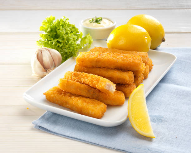 istock Fish Fingers with Salad and sauces 1127419288