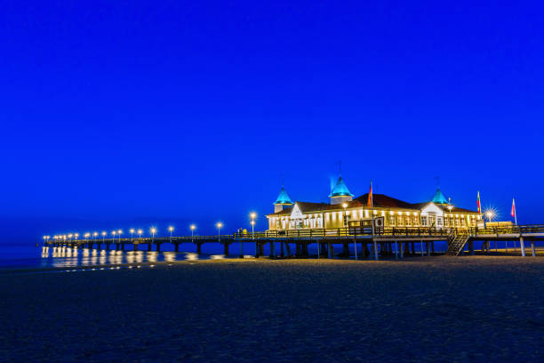 istock pier of Ahlbeck, Germany, at night 1127422407