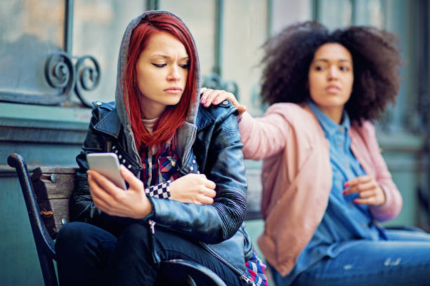 istock Girl is consoling her girlfriend after break up 1127426561