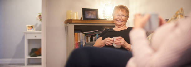 istock Having a gossip with a friend 1127426577