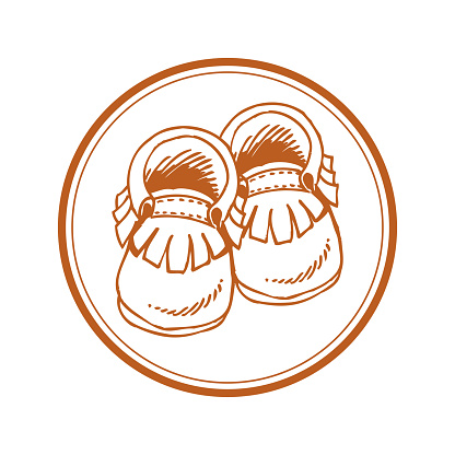 Baby moccasins with fringe in circle - hand drawn style cut out icon