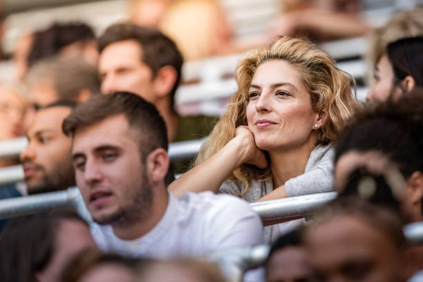istock Blonde woman in the stadium 1127427757