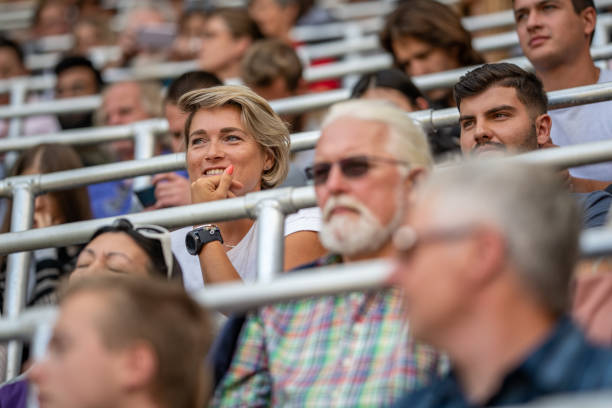 istock People watching a sports match on a stadium 1127427779
