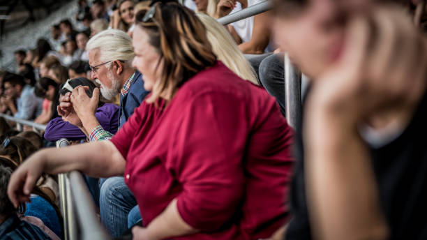 istock People watching a sports match on a stadium 1127427792