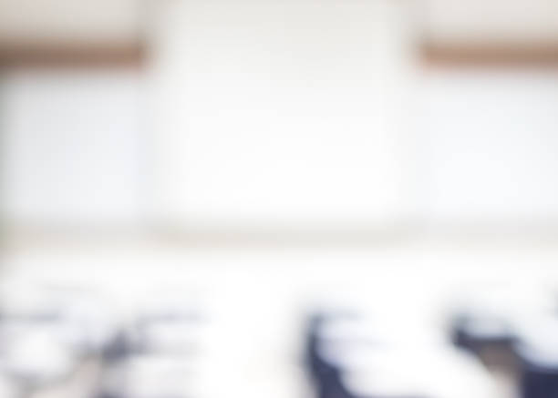 istock Blur classroom education background empty school class lecture room interior view with no teacher nor student 1127431650