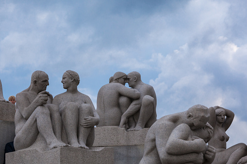 Sculpture of adult people by Gustav Vigeland. Sculpture was made by Gustav Vigeland who died in 1942. Park was opened in 1943. Frogner  Park is the world's largest sculpture park made by a single artist, and is one of Norway's most popular tourist attractions. The unique sculpture park is Gustav Vigeland's lifework with more than 200 sculptures in bronze, granite and wrought iron.