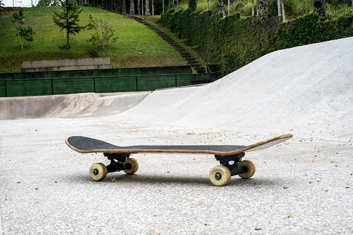 Skate board on a skate park.