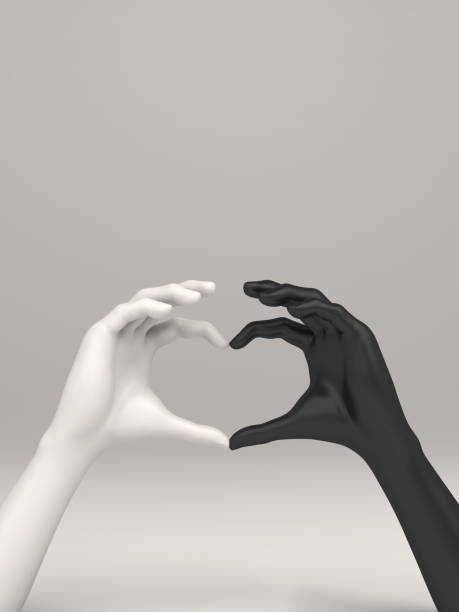 istock Black and white hands in heart shape on white background. 1127433496