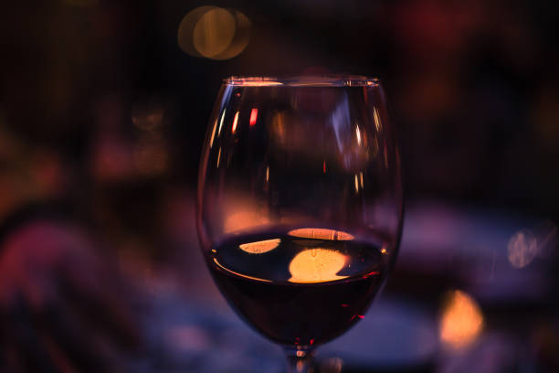istock red wine on young adults valentines day table 1127437445