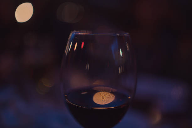 istock red wine on young adults valentines day table 1127437466