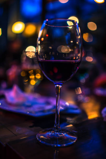 istock red wine on young adults valentines day table 1127437509