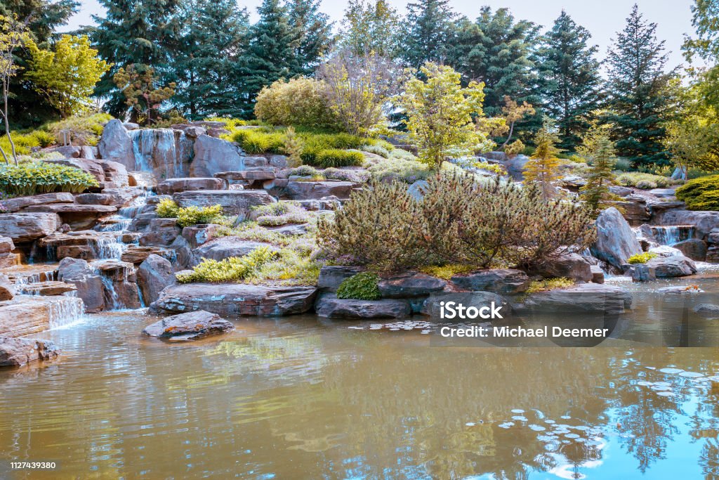 Relaxing waterfall in Grand Rapids Michigan at the Frederik Meijer Gardens Formal Garden Stock Photo