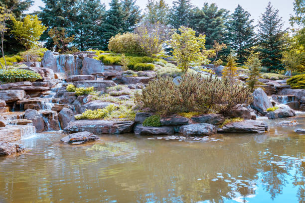 Relaxing waterfall in Grand Rapids Michigan at the Frederik Meijer Gardens stock photo