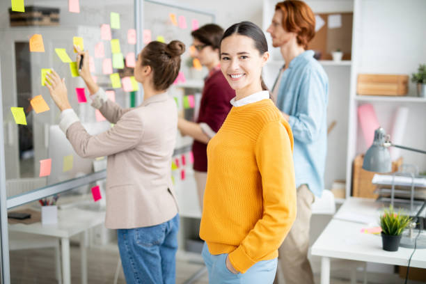 istock Girl in office environment 1127443187