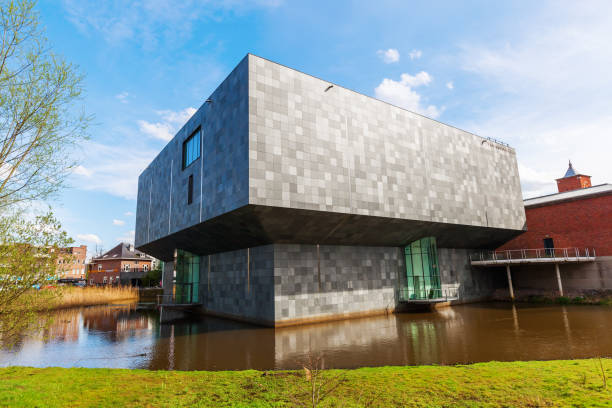 Eindhoven, Netherlands - April 12, 2016: new extension of the Van Abbemuseum with unidentified people. Its a museum of modern and contemporary art. The extension was designed by Abel Cahen, inaugurated 2003 by Queen Beatrix