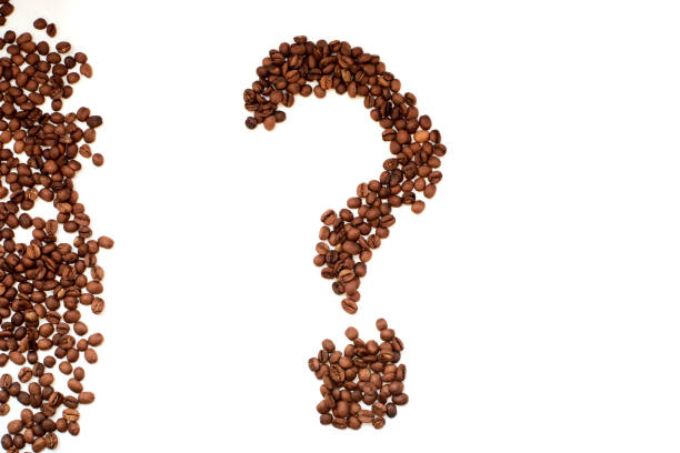 istock question mark of coffee beans closeup top view 1127451365