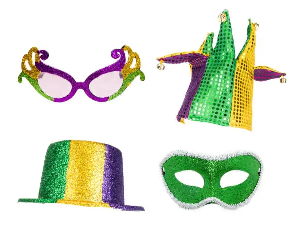 Festive Mardi Gras party hats, glasses and mask isolated on white for compositing