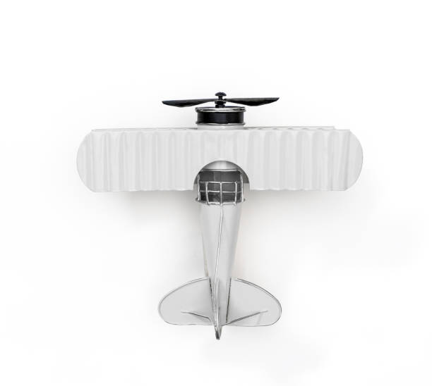 istock white Metal toy plane isolated on white 1127457556