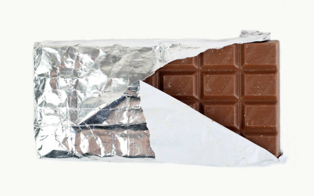 istock Partially Unwrapped Bar of Chocolate 1127460427