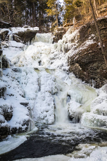 istock Frozen tiered waterfall covered in beautiful ice 1127463543