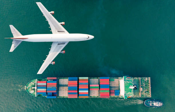 istock Aerial view logistics and transportation of Container Cargo ship and Cargo plane  for import export and transportation background. 1127463768
