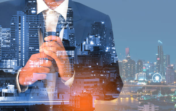 istock Double exposure businessmen are tired from work and night cityscape after work on white background. 1127464460
