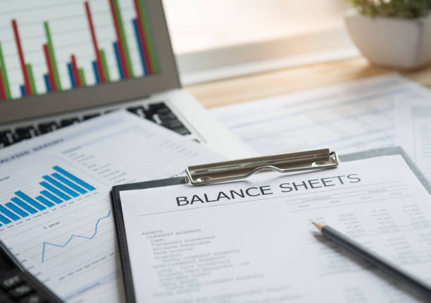 accounting reporting accounting concept. balance sheet and business earning report on desk. financial statement stock pictures, royalty-free photos & images