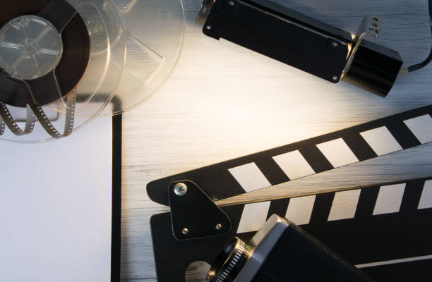 istock on the table by the projector illuminated a place for a label, laid out the items, take to shoot, tablet to record 1127464595