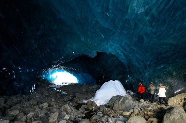 istock Guided tour in a majestic ice cave 1127468514