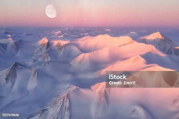 Ellesmere Island Mountain Tops Bathed In Light As The Sun Began To Peak Over The Horizon Elements Of This Image Furnished By Nasa Stock Photo - Download Image Now