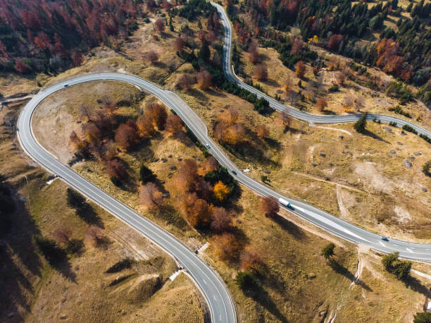 istock dron view on transalpina road with cars 1127474863